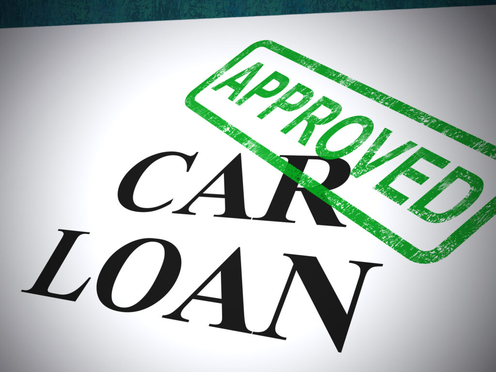 Car loan application approved stamp shows acceptance of auto finance. A line of credit document