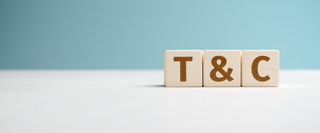 "T&C" - the abbreviation for Terms and Conditions built from letters on wooden cubes
