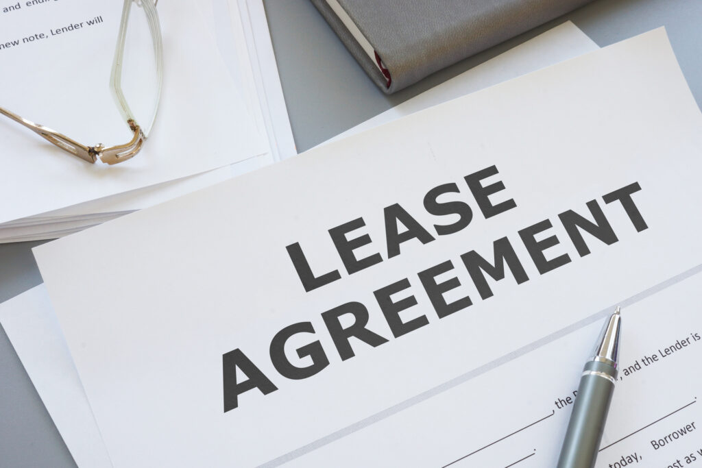 Lease agreement is shown on a photo using the text