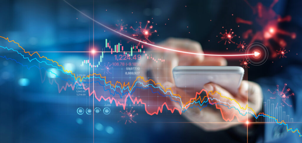 Economic crisis, Businessman using mobile smartphone analyzing sales data and economic graph chart that is falling 